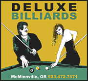 advertisement for Deluxe Billiards